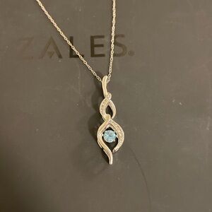 Swiss Blue Topaz and White Sapphire Infinity Pendant in Sterling Silver